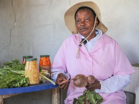 Mamolise showcasing her production from her garden