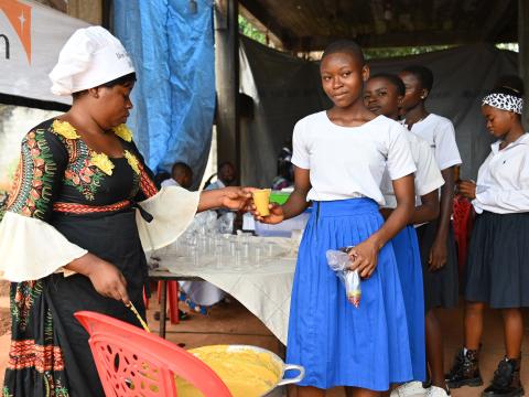 Children receiving food at school