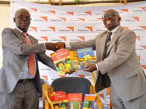 World Vision Uganda Donates Scholastic Materials To 600 UPE Schools ...