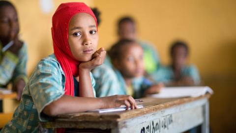 Girl learning in school