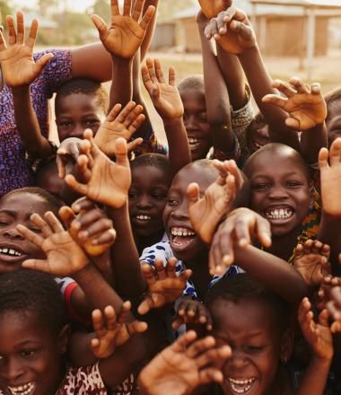 A group of happy and smiling school children in Ghana