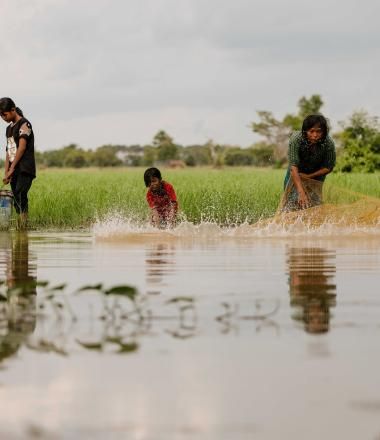 Sambath and Laum from Cambodia, fishing with their grandmother