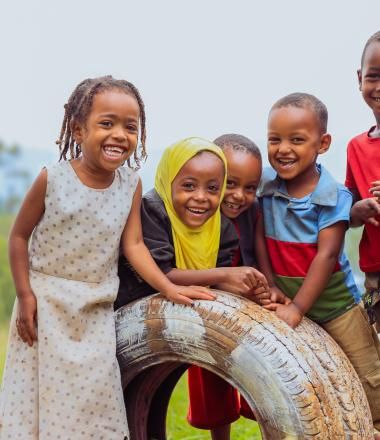 Children smiling at the playground