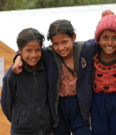 Children in front of a TLC